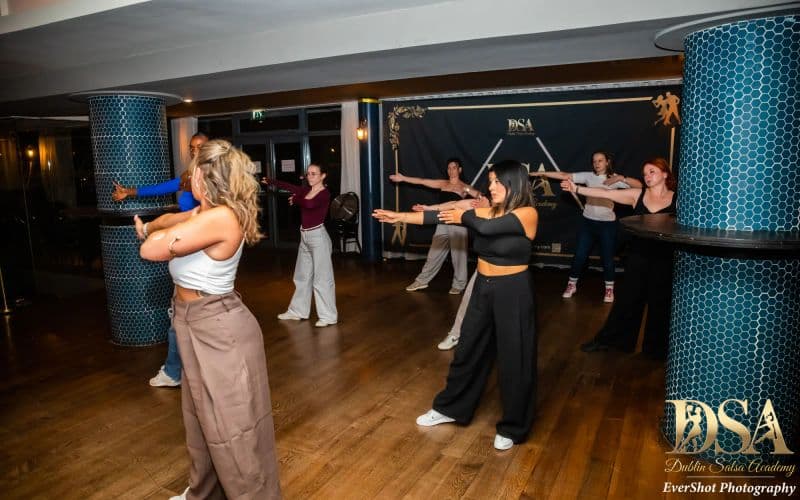 A couple learning to dance together at a beginner class in Dublin city centre